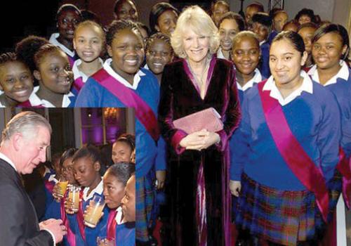 Maria Fidelis Convent School gospel choir members pose with The Royal couple