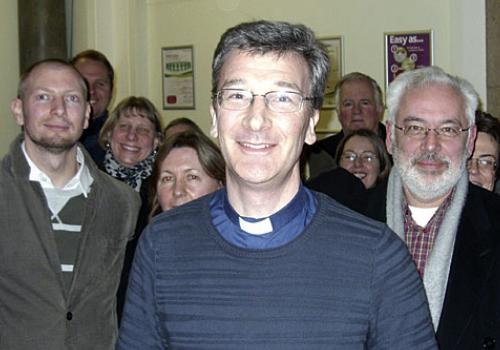 A delighted Rev Jonathan Rust with supporters on Tuesday night