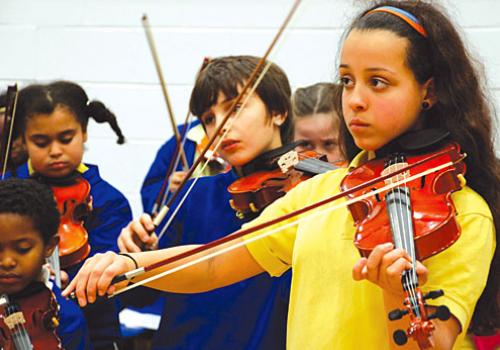 Music First pupils from Highbury Quadrant School practising