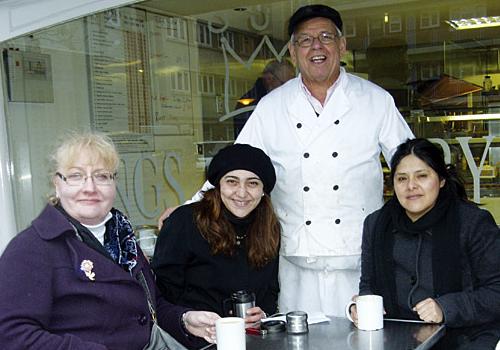 Fish Central’s George Hussein with customers Dora, Aysin and Ximena