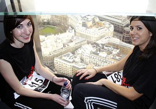 Jessica Tomkins and Nathalie Mogg recuperate at the top of Tower 42