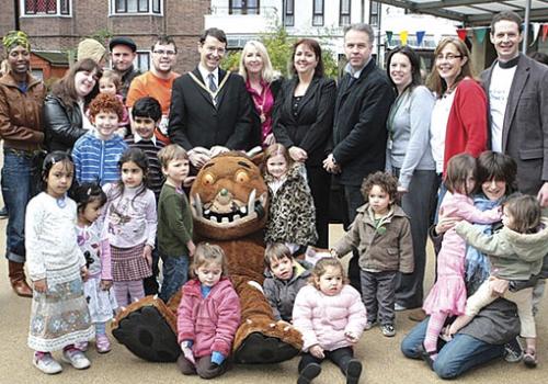 Families and councillors enjoy the celebrations with The Gruffalo