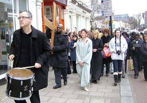 Simon of Cyrene, played by Tony Ashley, carries the cross