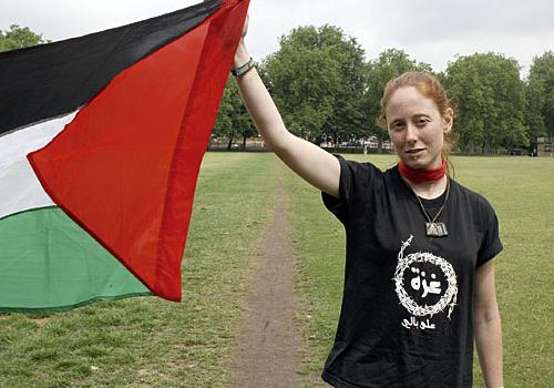 Alex Harrison flies the Palestinian flag on Highbury Fields last year