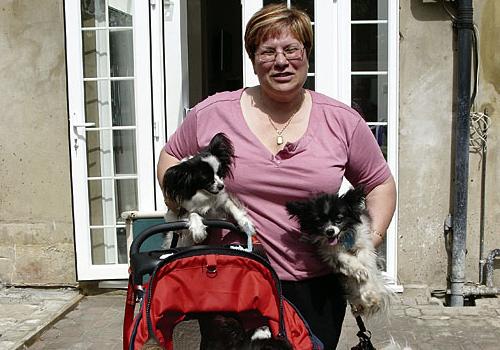 Caroline Schwartz with members of her canine family outside her Holloway home