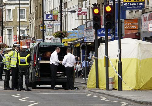 Police at the scene of the fatal accident in Seven Sisters Road on Thursday