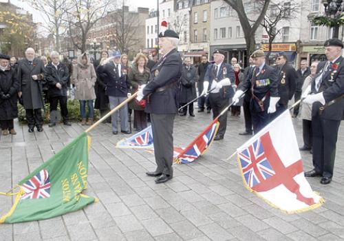 Scene outside the town hall as a two-minute silence is observed