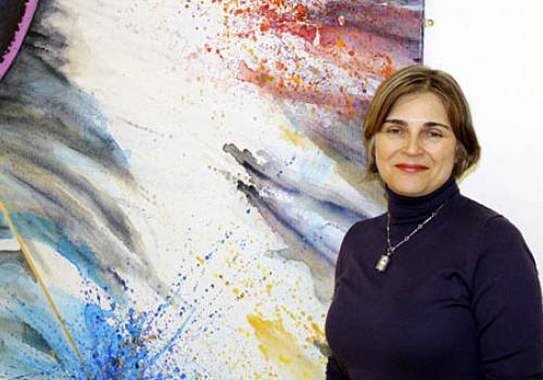 Artist Susan Rosenberg with one of her works