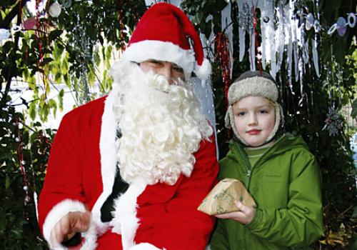 Santa (Stephen Mason) with Theo Roweth, age seven 