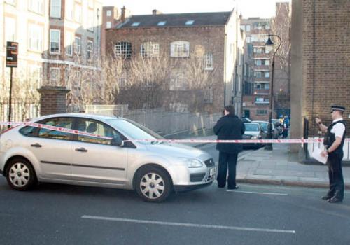 Pictured: Police at the scene of the stabbing in Kentish Town.