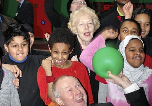 Councillors Keith Moffitt and Flick Rea celebrate with youngsters at the centre