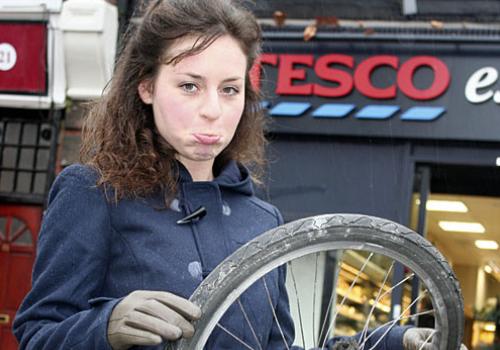 Kate Ambler with the remains of her old bike