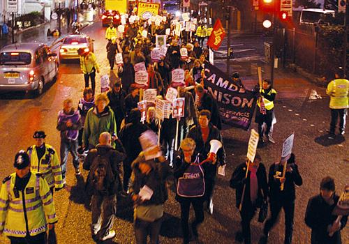 Demonstrators march down Euston Road