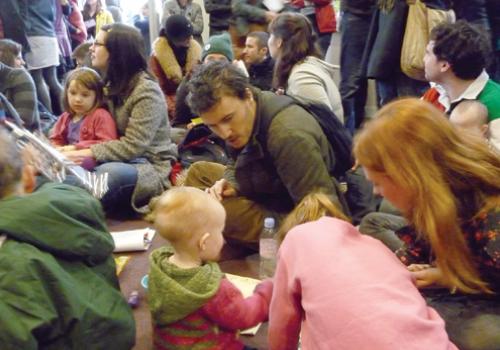 Parents turn the floor of Camden Town NatWest into a creche on Saturday