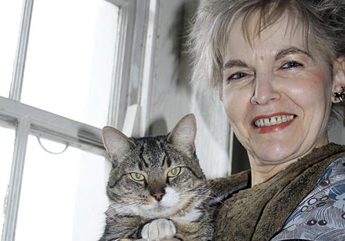 Marion Dill with her cat Manu