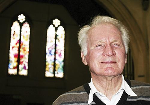 Rev Donald MacArthur and the stained-glass windows at St Andrews