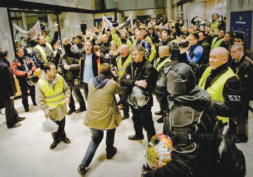 Anti-parking fee protesters took their fight to City Hall in February last year