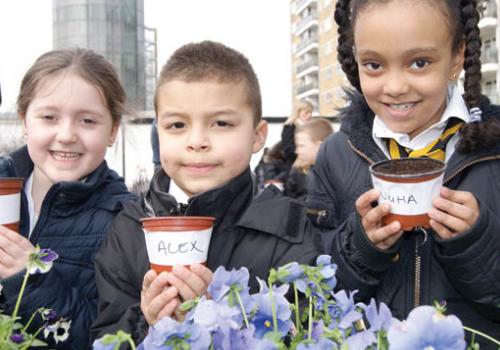 Green-fingered pupils from St Gabriel’s primary school in Pimlico, from left, Ja