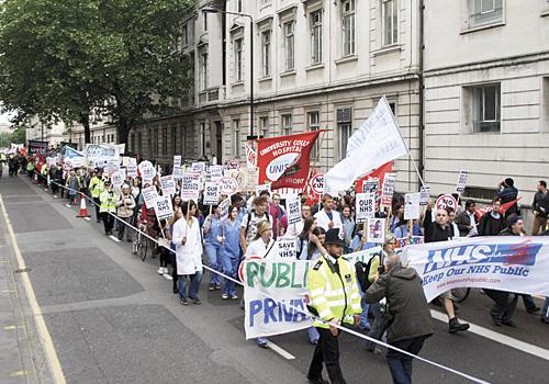 The NHS protest marchers make their way down Gower Street in Bloomsbury