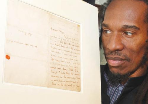  Poet Benjamin Zephaniah with the letter. 