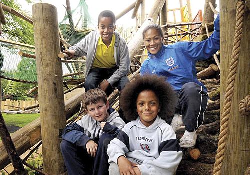 Rachel Yankey with Chinedu Kalu, 11, and Jamie Bloxham and Trey Lewis