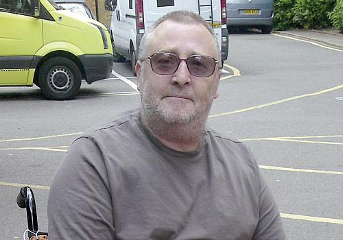 Derek Bassett outside the South Wing of St Pancras Hospital