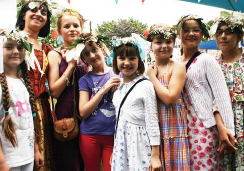 Pupils at the Holy Trinity and St Silas School Summer Fair.  