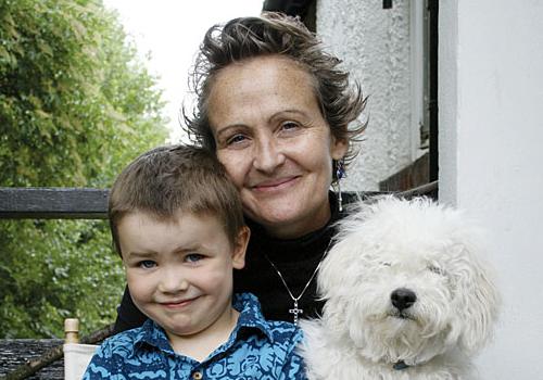 Lucas with his mother Rose and Sandy the dog