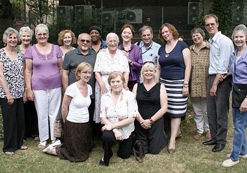 Peggy (centre with glasses) with current and former Netley primary staff