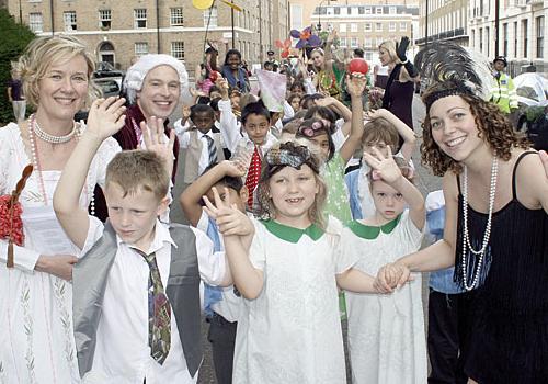 Teachers and pupils parade through the streets around Coram’s Fields