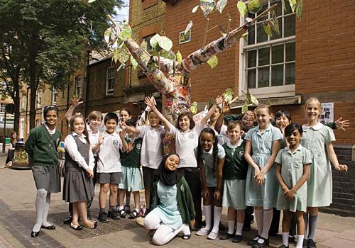 Pupils from St Joseph’s Primary school with their ‘junk mail’ tree