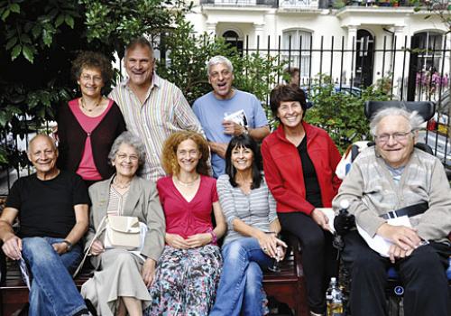 Lily Mitchell surrounded by her family on the memorial bench