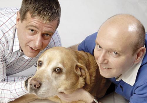 Cllr Martin Davies, right, with partner Richard Boaste and their dog Benson