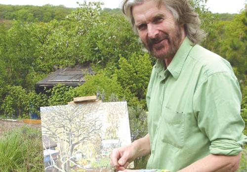 Patrick Cullen painting at his allotment. His works are on display at Highgate G