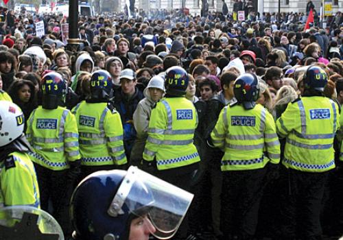 Students are ‘kettled’ by police on Whitehall during the protests