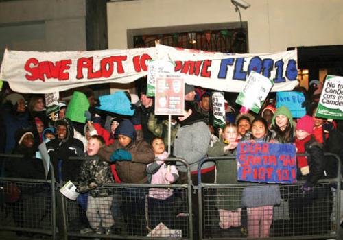 Demonstrators against cuts outside Camden Town Hall late last night. 