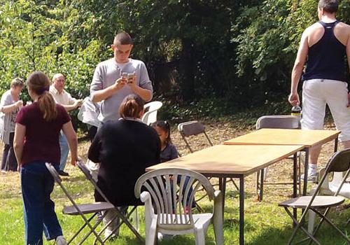 Residents enjoying a recent barbecue in Marie Lloyd Gardens, which campaigners s