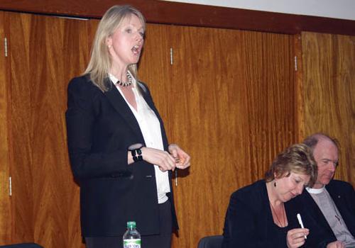 Joanne Cash speaking at the Harrow Road hustings with rival Karen Buck sitting n