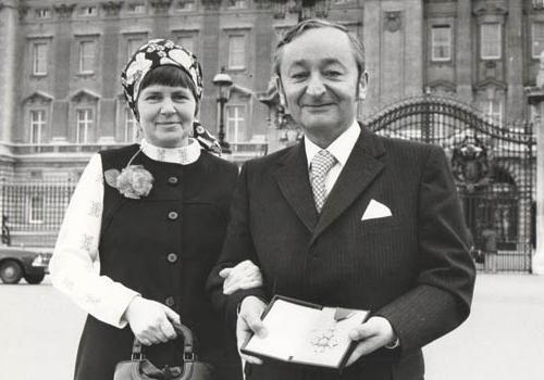 Gerry Mansell with his wife Diana at the Palace collecting his CBE