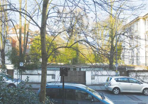 The current flat-roof buildings