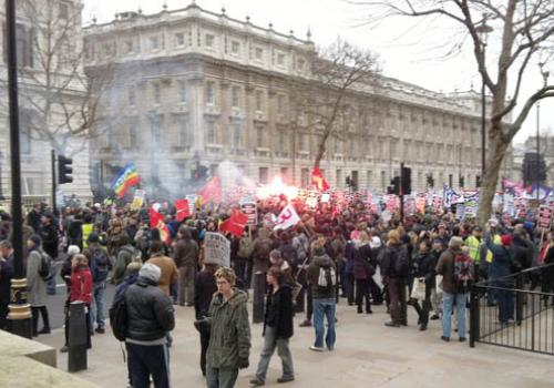 Protesters light flares