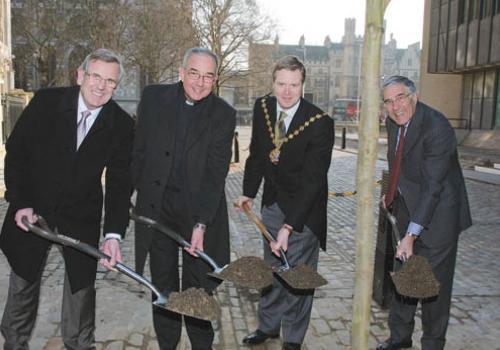 Mayor Sandys (third left) planting the tree for Ash Wednesday