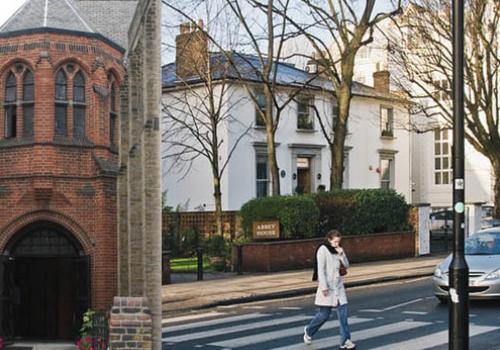 The Abbey Road zebra crossing. Inset: St Mary the Virgin church