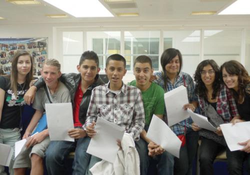 Students with their results slips at Paddington Academy