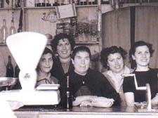 Carlos's family in their Malaga delicatessen