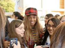 Contestant Shaniece from Miss Frank is mobbed by young fans as she leaves the  X Factor house in Golders Green